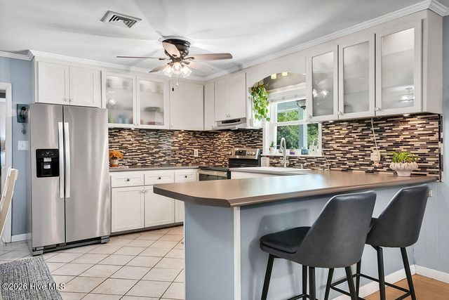 103 NW 25th Street, Oak Island, NC 28465