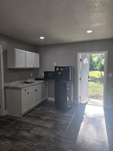 10408 N WOODMERE ROAD 1, Tampa, FL 33617