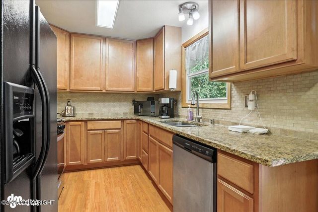 17345 Meadow Creek Drive, Eagle River, AK 99577