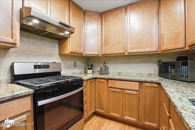 17345 Meadow Creek Drive, Eagle River, AK 99577