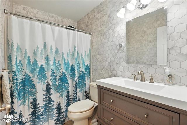 17345 Meadow Creek Drive, Eagle River, AK 99577
