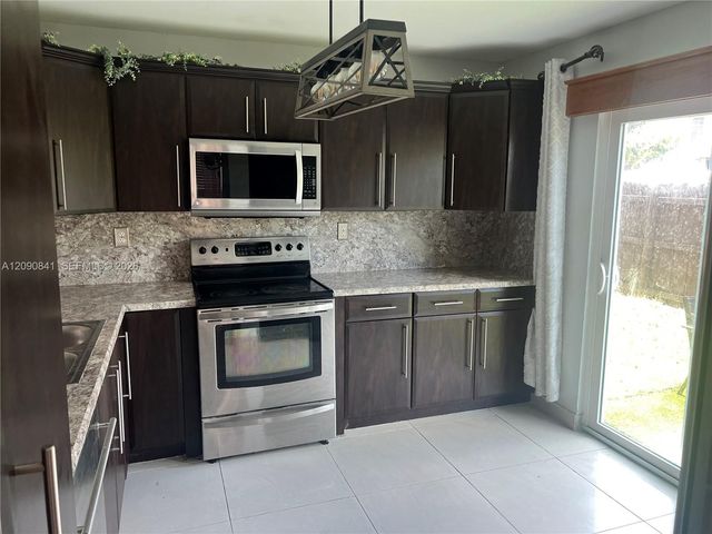 5788 Woodland Point Drive, Tamarac, FL 33319