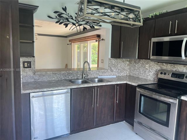 5788 Woodland Point Drive, Tamarac, FL 33319