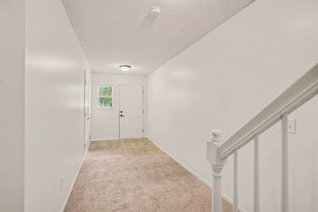 697 Kingfisher Lane H, Woodbury, MN 55125 — photo 2