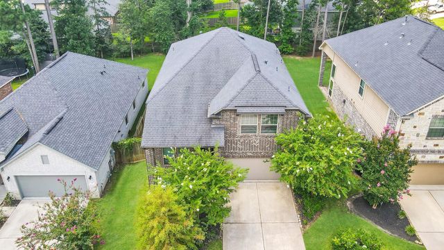 309 Serenata Woods Trail, Willis, TX 77318