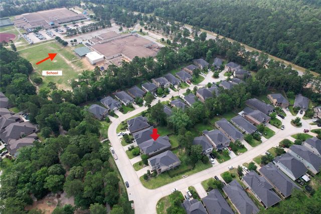 309 Serenata Woods Trail, Willis, TX 77318