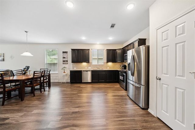 2324 N Amber Ruse Court, Conroe, TX 77304