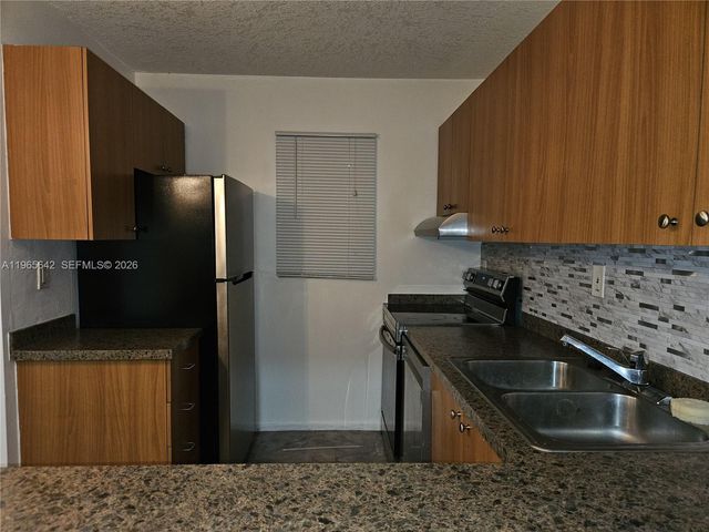 7610 Stirling Road 102C, Davie, FL 33024