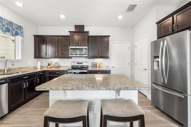 8048 ARTISAN CIRCLE, Seminole, FL 33777