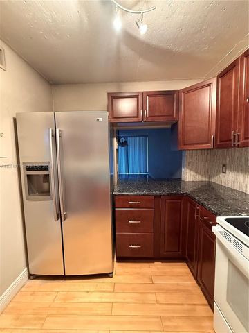 9450 Live Oak Pl 104, Davie, FL 33324