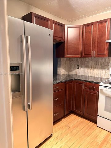 9450 Live Oak Pl 104, Davie, FL 33324