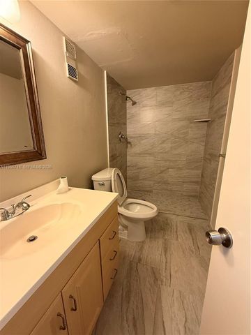 9450 Live Oak Pl 104, Davie, FL 33324