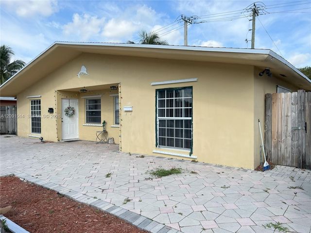 311-315 NW 57th Street, Oakland Park, FL 33309