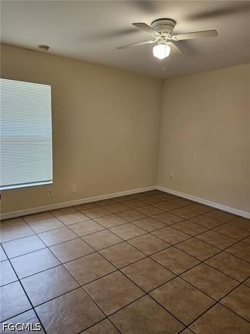 713 Jenna AVE S, Lehigh Acres, FL 33973