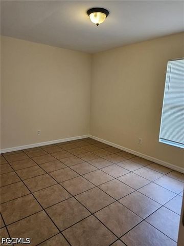 713 Jenna AVE S, Lehigh Acres, FL 33973
