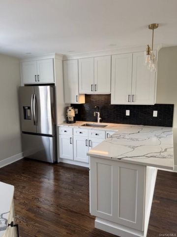 62 E 1st Street, Freeport, NY 11520