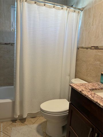 65 Morning Glory Road, Levittown, NY 11756