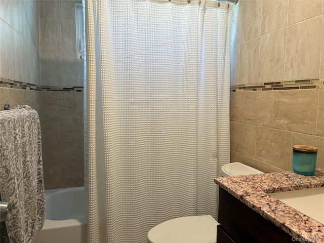 65 Morning Glory Road, Levittown, NY 11756