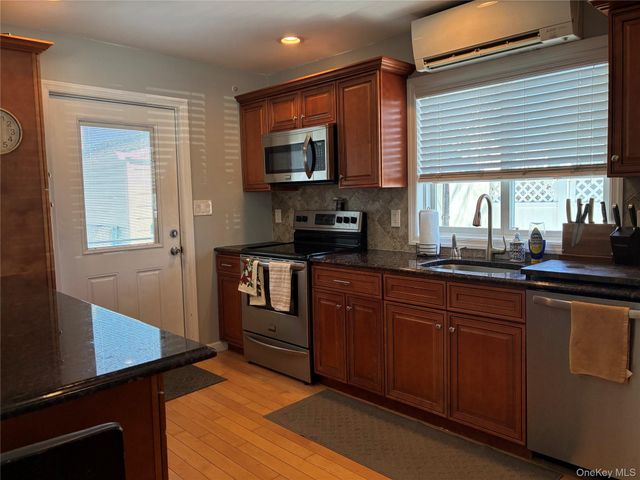 65 Morning Glory Road, Levittown, NY 11756