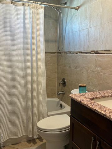 65 Morning Glory Road, Levittown, NY 11756