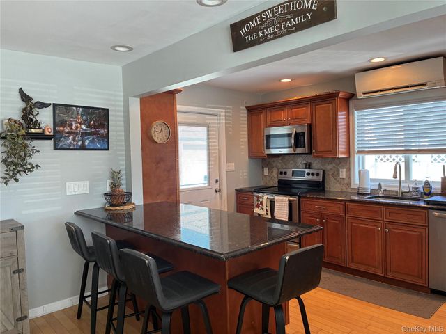 65 Morning Glory Road, Levittown, NY 11756