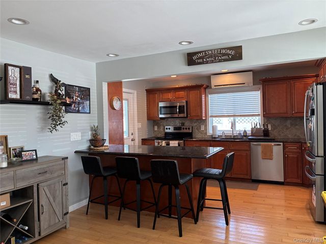 65 Morning Glory Road, Levittown, NY 11756