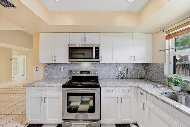 906 CARLTON ROAD, Tarpon Springs, FL 34689