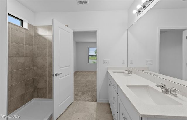 242 Silent Lake DR, Lehigh Acres, FL 33936