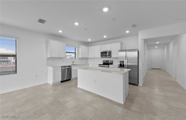 242 Silent Lake DR, Lehigh Acres, FL 33936