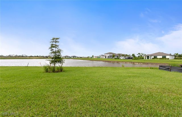 242 Silent Lake DR, Lehigh Acres, FL 33936