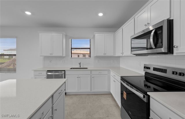 242 Silent Lake DR, Lehigh Acres, FL 33936