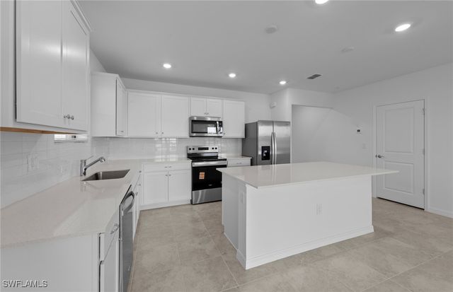 242 Silent Lake DR, Lehigh Acres, FL 33936