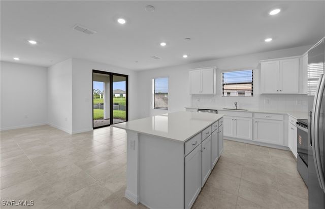 242 Silent Lake DR, Lehigh Acres, FL 33936