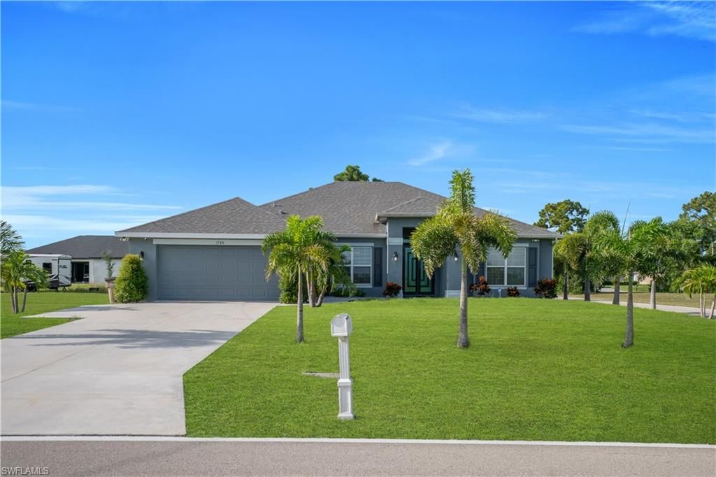 Image 1 of property listing at 1728 Diplomat PKWY W, Cape Coral, FL 33993
