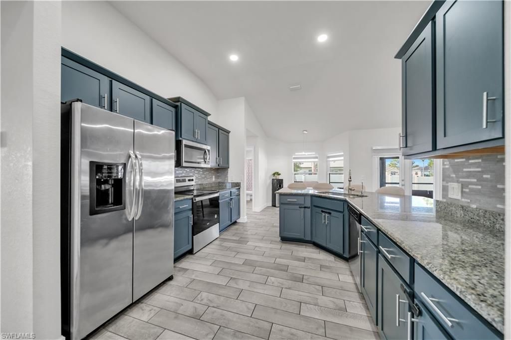 Image 12 of property listing at 1728 Diplomat PKWY W, Cape Coral, FL 33993