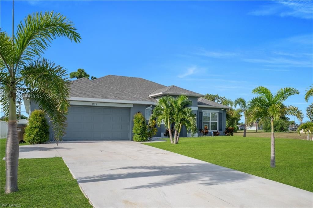 Image 2 of property listing at 1728 Diplomat PKWY W, Cape Coral, FL 33993
