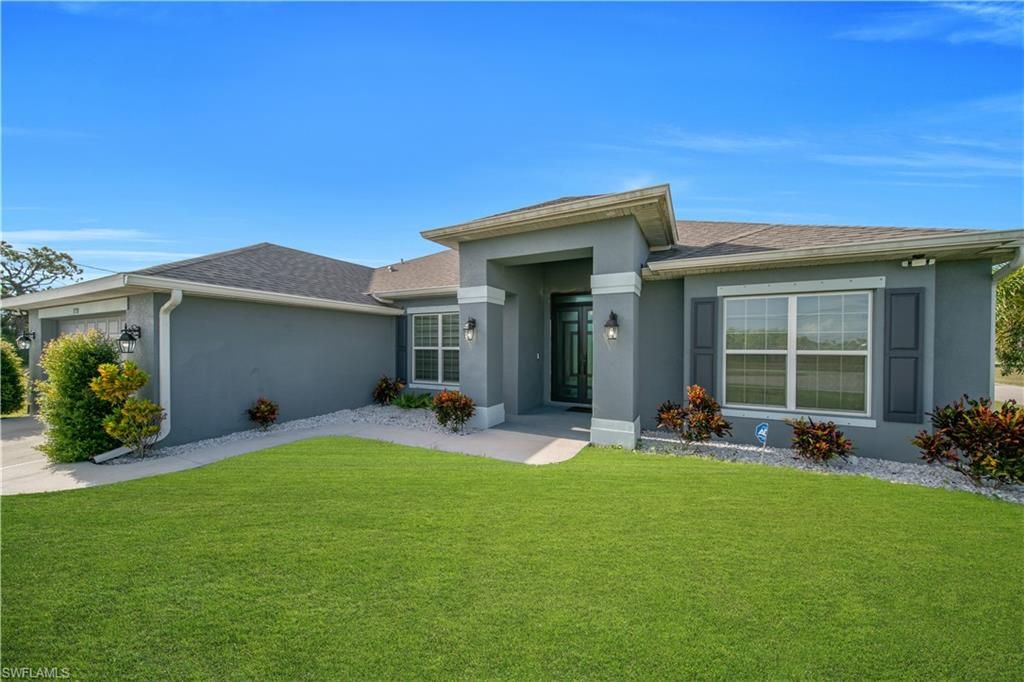 Image 3 of property listing at 1728 Diplomat PKWY W, Cape Coral, FL 33993