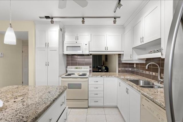 6095 N Sabal Palm Boulevard 210, Tamarac, FL 33319