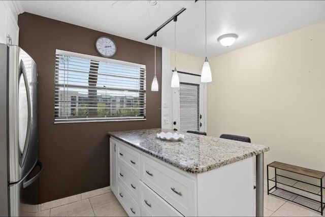 6095 N Sabal Palm Boulevard 210, Tamarac, FL 33319