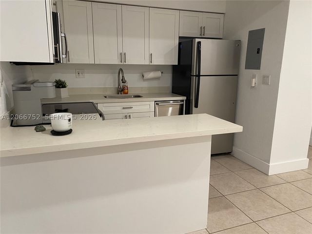 1 Edgewater Dr 103, Coral Gables, FL 33133