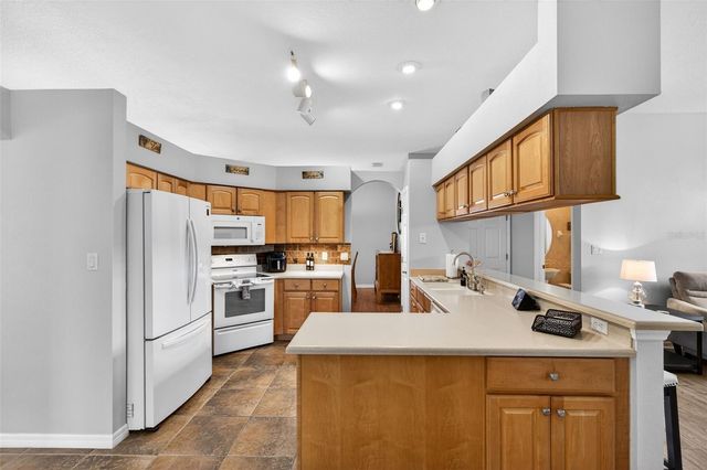 5036 SAWGRASS LAKE CIRCLE, Leesburg, FL 34748