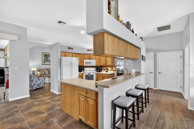 5036 SAWGRASS LAKE CIRCLE, Leesburg, FL 34748