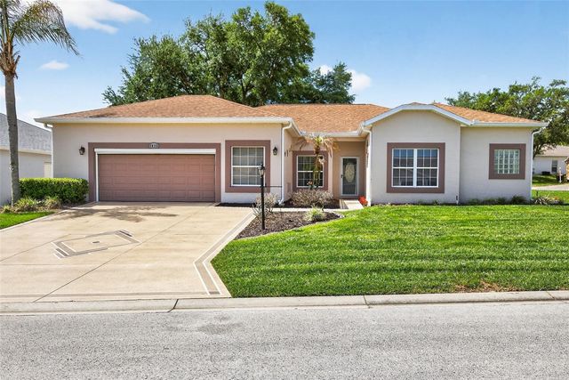 5036 SAWGRASS LAKE CIRCLE, Leesburg, FL 34748