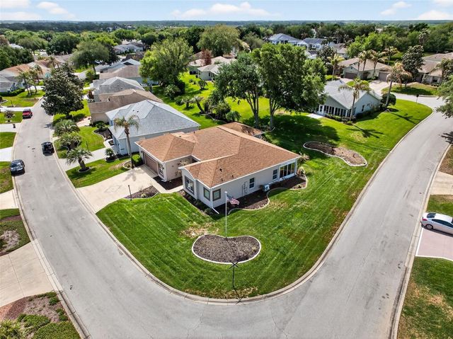 5036 SAWGRASS LAKE CIRCLE, Leesburg, FL 34748