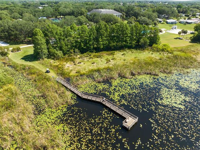 5036 SAWGRASS LAKE CIRCLE, Leesburg, FL 34748