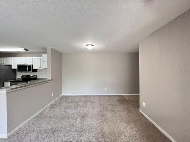 7511 SEURAT STREET 205, Orlando, FL 32819