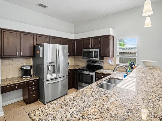 1251 RAVIDA WOODS DRIVE, Apopka, FL 32703