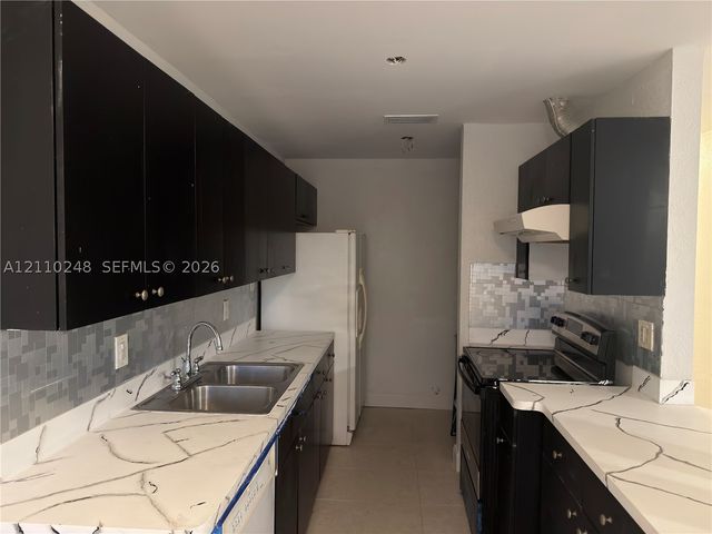 311-315 NW 57th St 311, Oakland Park, FL 33309