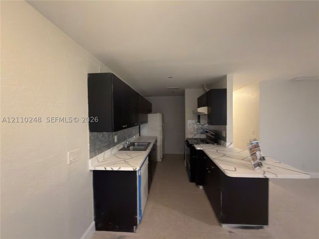 311-315 NW 57th St 311, Oakland Park, FL 33309