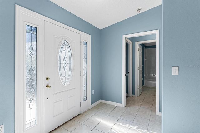 1009 FOREST BREEZE PATH, Leesburg, FL 34748